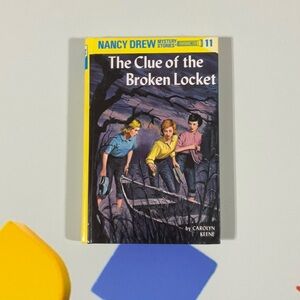 The Clue of the Broken Locket